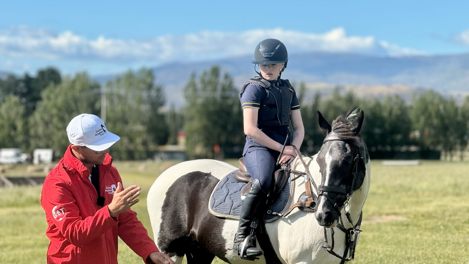 Dan Bizzarro coaching a rider during an eventing lesson in Oxfordshire