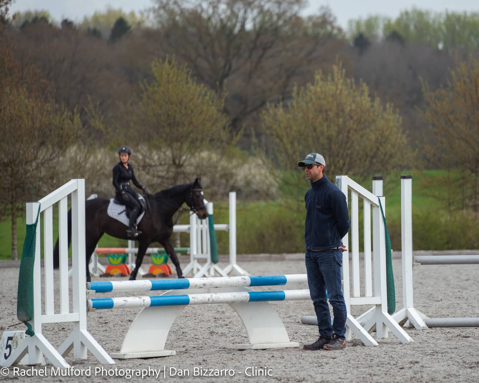 Dan Bizzarro teaching show jumping at clinic